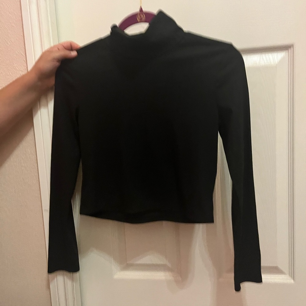 A turtle neck crop top
